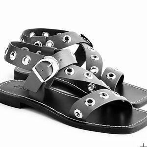 Black cross strap grommet sandals